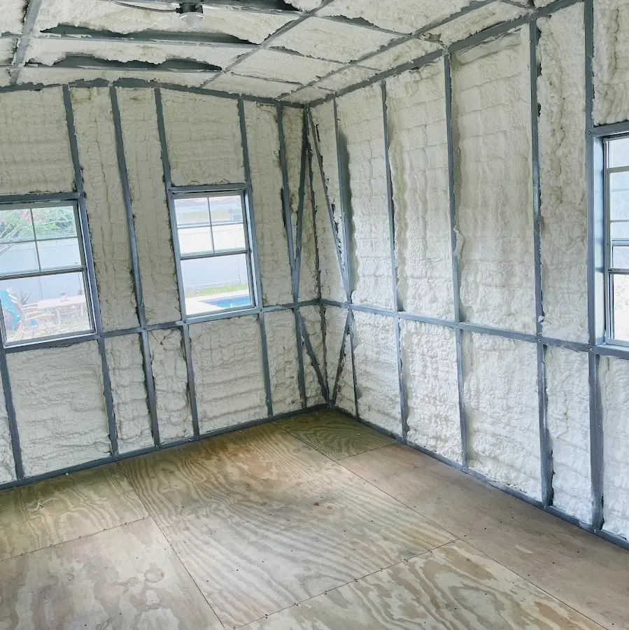 Closed-cell spray foam insulation applied to wall cavities in a residential project in Four Corners